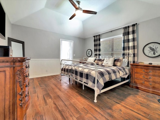 bedroom featuring vaulted ceiling, hardwood / wood-style floors, and ceiling fan