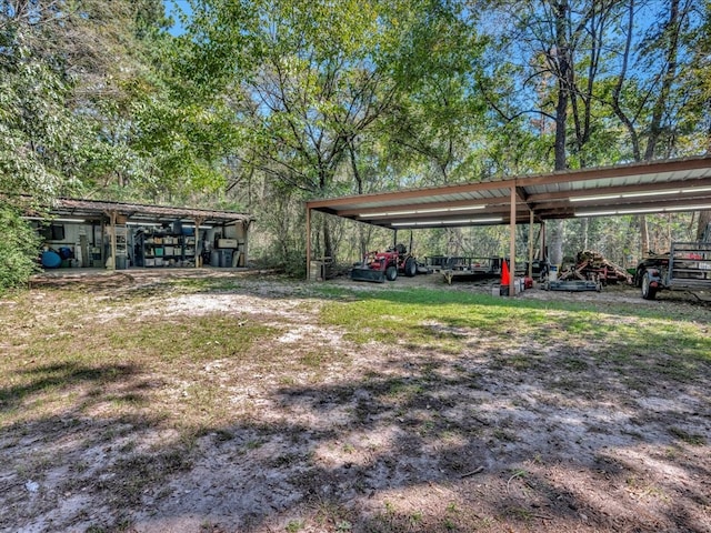 view of yard featuring a carport