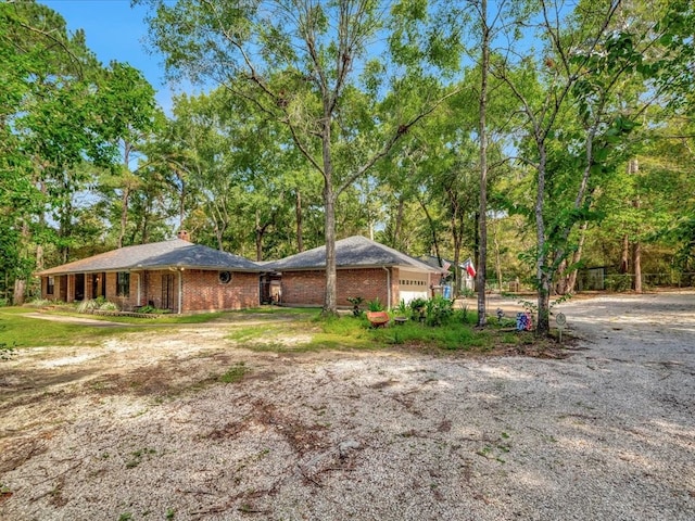 view of side of property featuring a garage