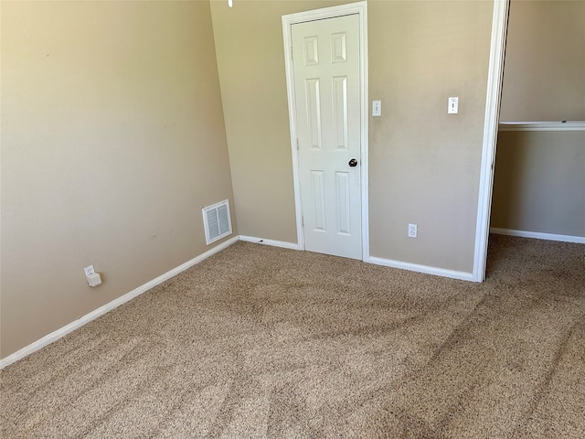 unfurnished bedroom with carpet flooring