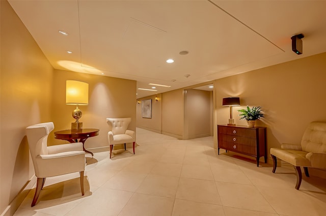 sitting room featuring light tile patterned floors