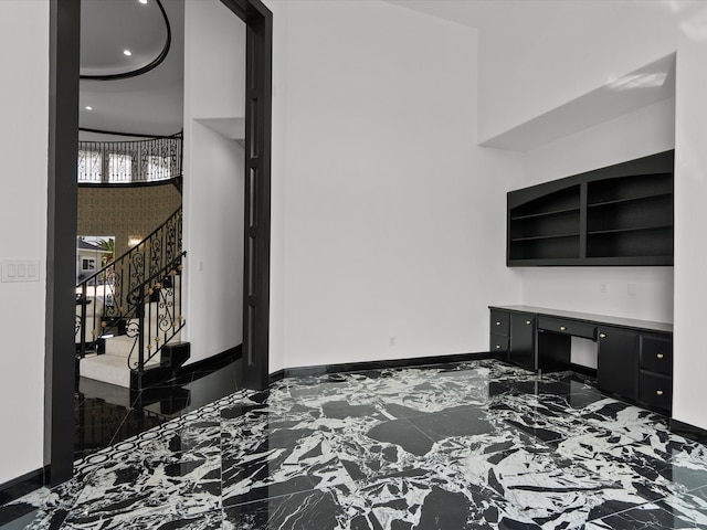 bedroom featuring a towering ceiling