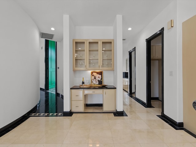 interior space featuring light tile patterned floors