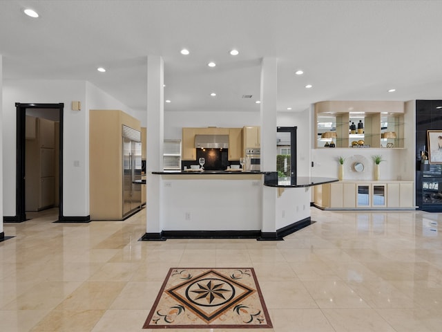 kitchen featuring extractor fan and stainless steel appliances