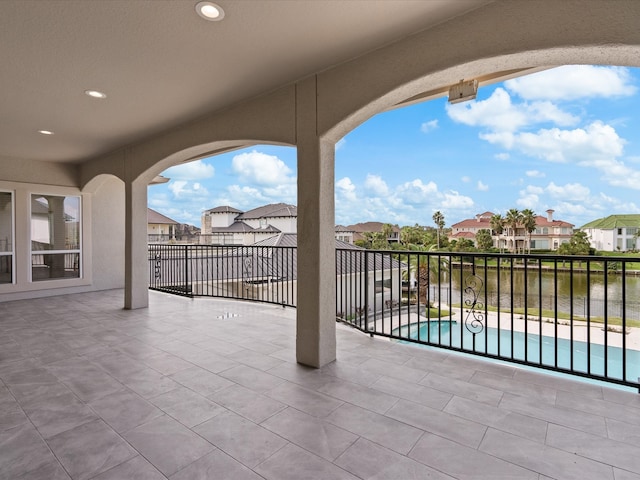 view of patio with a fenced in pool