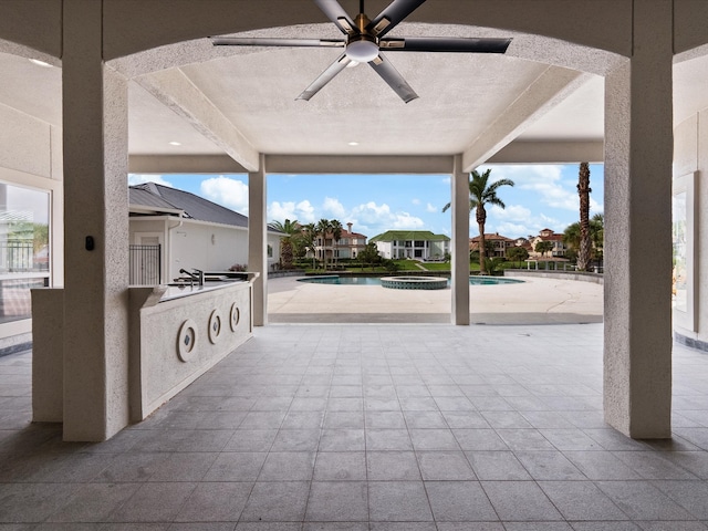 view of patio with ceiling fan