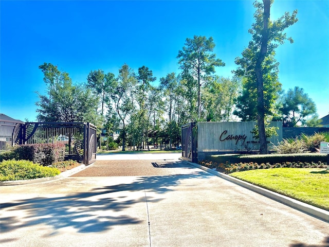 11915 Parsifal Creek Rd, Humble, TX 77346 - view of road with curbs and a gated entry