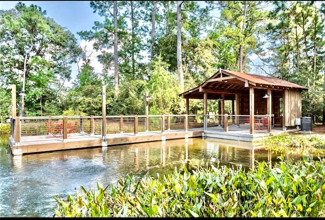 view of home's community featuring a gazebo and a water view