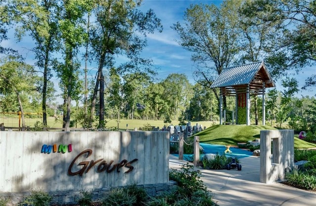 11915 Parsifal Creek Rd, Humble, TX 77346 - community sign featuring a yard