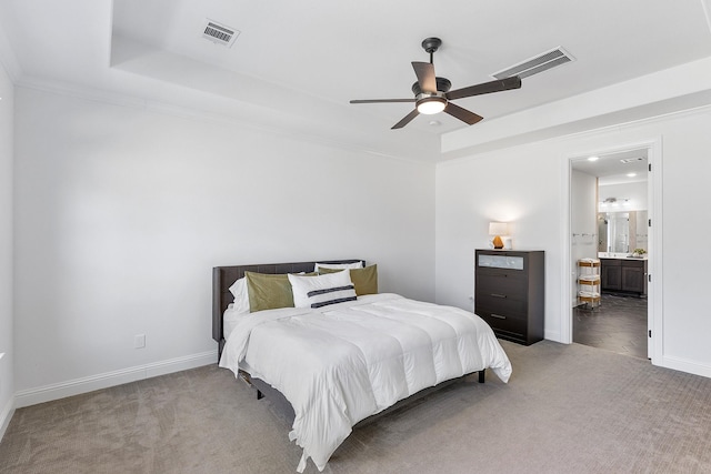 11915 Parsifal Creek Rd, Humble, TX 77346 - carpeted bedroom with visible vents, a tray ceiling, and baseboards