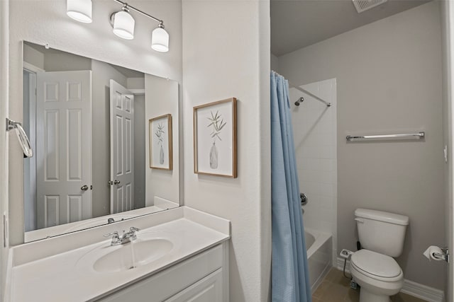 full bathroom with shower / tub combo with curtain, vanity, toilet, and tile patterned flooring