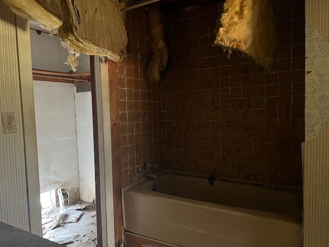 bathroom featuring a tub to relax in