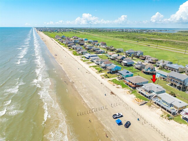 aerial view featuring a beach view and a water view