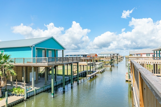 dock area with a water view