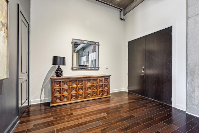 foyer featuring dark hardwood / wood-style floors