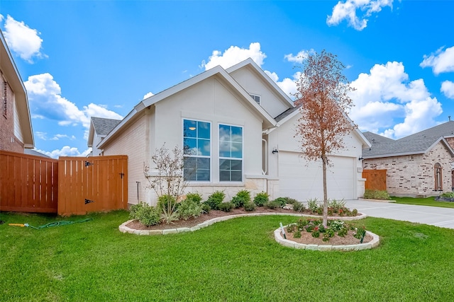 910 Rosewood Trl, Beasley, TX 77417 - view of front facade featuring a garage, concrete driveway, and a front yard