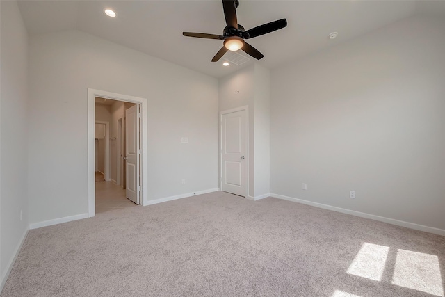 910 Rosewood Trl, Beasley, TX 77417 - unfurnished bedroom featuring light colored carpet, vaulted ceiling, baseboards, and recessed lighting