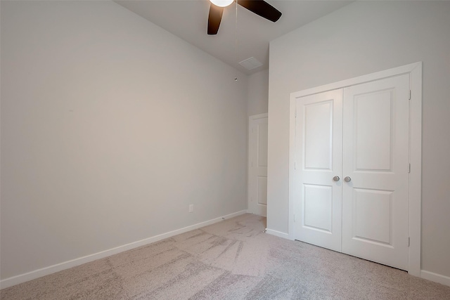 910 Rosewood Trl, Beasley, TX 77417 - unfurnished bedroom with vaulted ceiling, a closet, a ceiling fan, light carpet, and baseboards