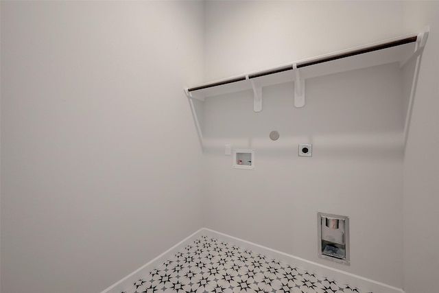 910 Rosewood Trl, Beasley, TX 77417 - laundry room with hookup for a gas dryer, washer hookup, hookup for an electric dryer, laundry area, and baseboards