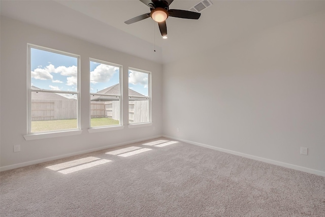 910 Rosewood Trl, Beasley, TX 77417 - carpeted spare room featuring baseboards, visible vents, and a ceiling fan