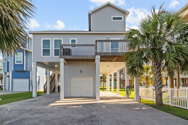 beach home featuring a carport and a garage