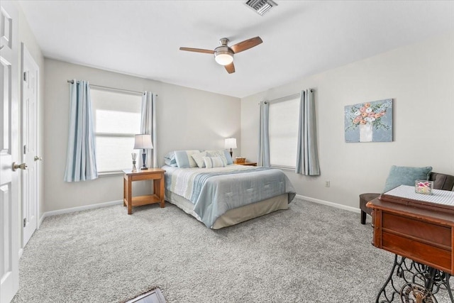 175 S Circle Dr, Livingston, TX 77351 - bedroom with a ceiling fan, carpet, baseboards, and visible vents