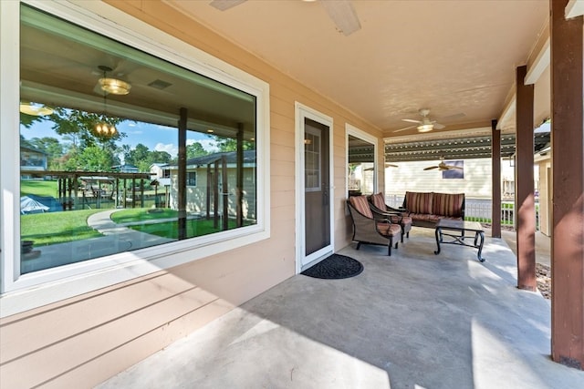 view of patio featuring ceiling fan