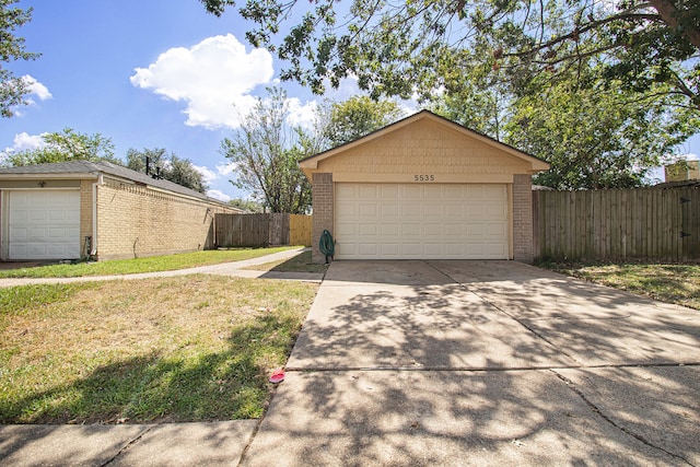 garage with a lawn