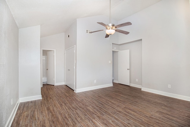 unfurnished room with high vaulted ceiling, ceiling fan, and dark hardwood / wood-style flooring