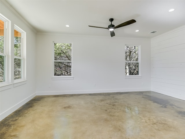 spare room featuring ornamental molding, ceiling fan, and plenty of natural light