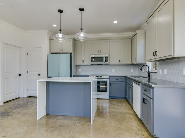 kitchen with appliances with stainless steel finishes, a kitchen island, decorative light fixtures, ornamental molding, and sink