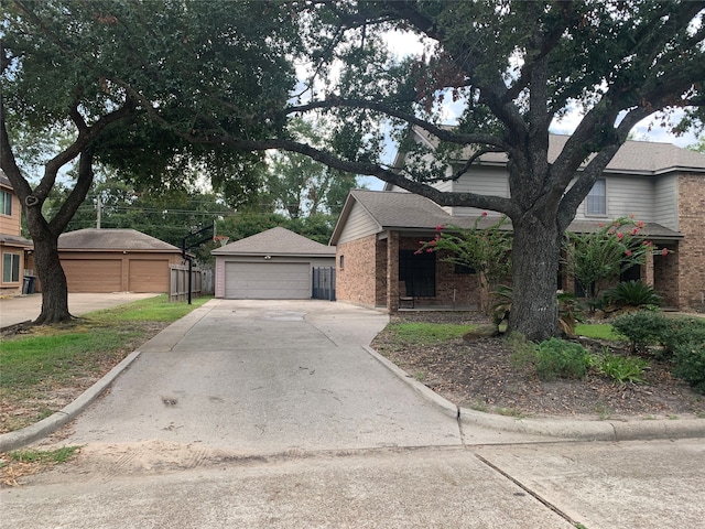 view of front of house featuring an outdoor structure and a garage