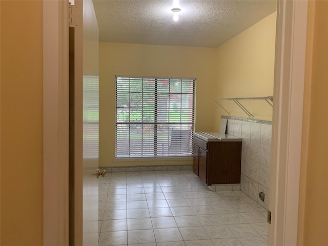 interior space with light tile patterned floors