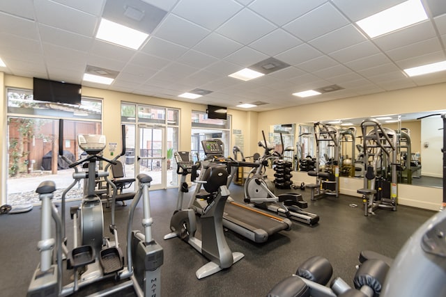 gym with a drop ceiling