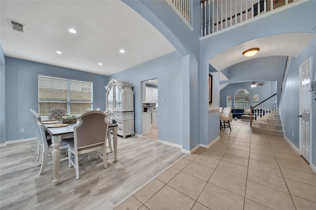 dining area featuring light wood-type flooring and ceiling fan