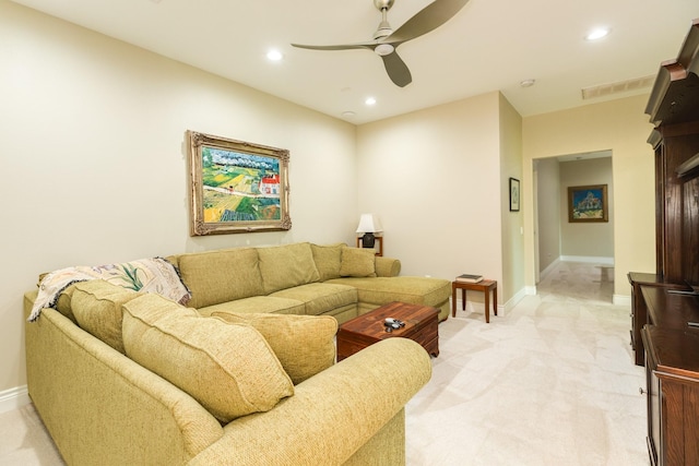 53 Island Psge, Galveston, TX 77554 - living area with light carpet, baseboards, ceiling fan, and recessed lighting