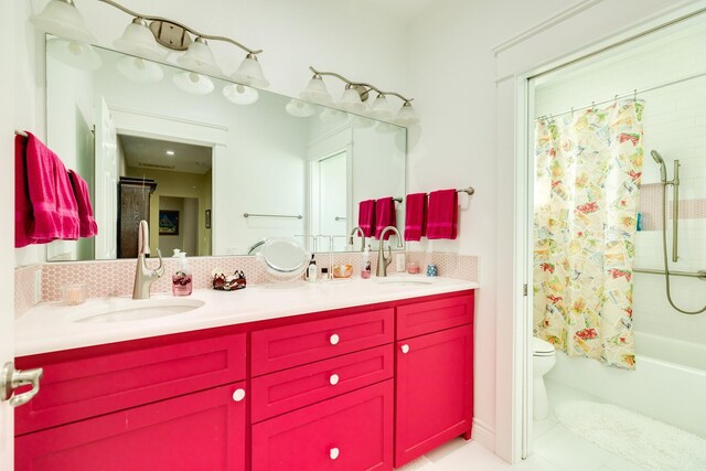 full bathroom with vanity, shower / tub combo, toilet, and tile patterned floors