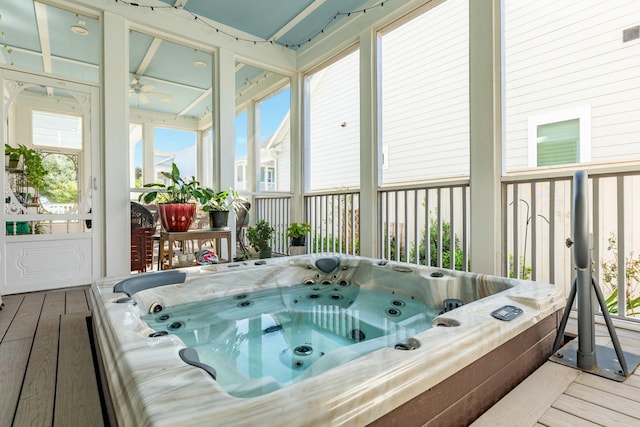 53 Island Psge, Galveston, TX 77554 - sunroom / solarium with ceiling fan and a hot tub