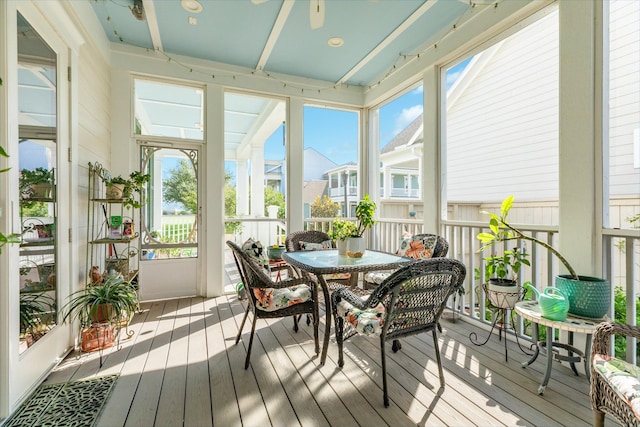 53 Island Psge, Galveston, TX 77554 - sunroom / solarium with outdoor dining space and a ceiling fan