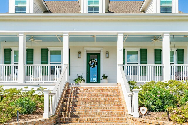 property entrance featuring a porch and ceiling fan