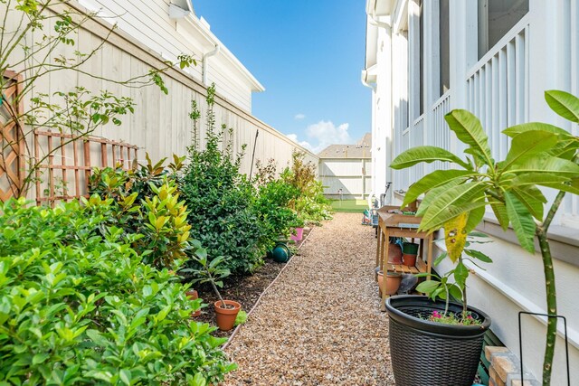53 Island Psge, Galveston, TX 77554 - view of yard featuring a fenced backyard