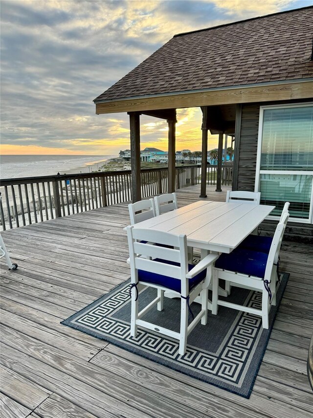 deck at dusk with a water view