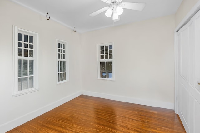 spare room with ceiling fan and hardwood / wood-style floors