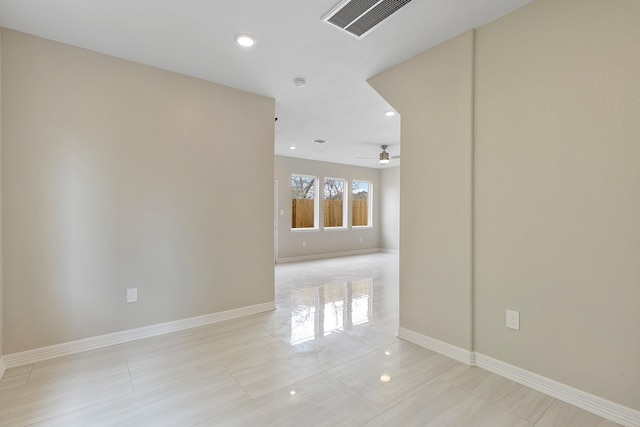 spare room featuring ceiling fan