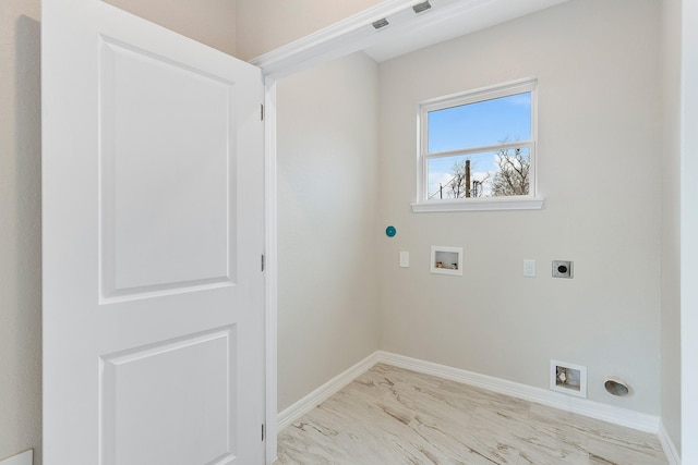 laundry area featuring electric dryer hookup and washer hookup