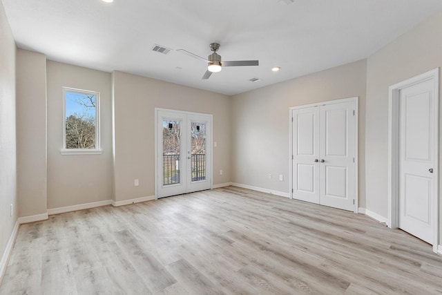 unfurnished bedroom with french doors, ceiling fan, light wood-type flooring, and access to outside