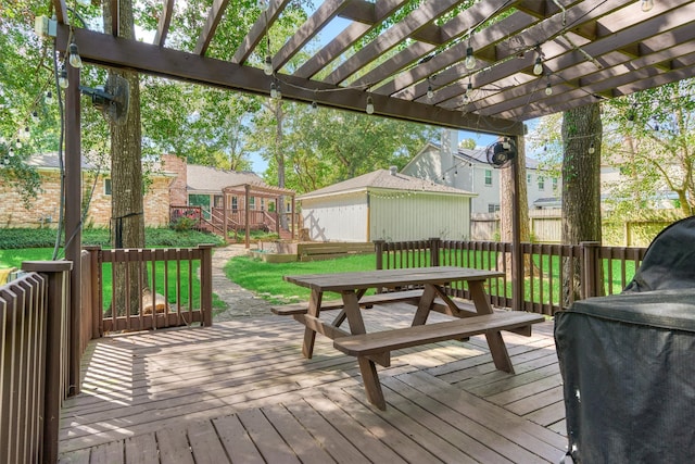 wooden deck featuring a pergola