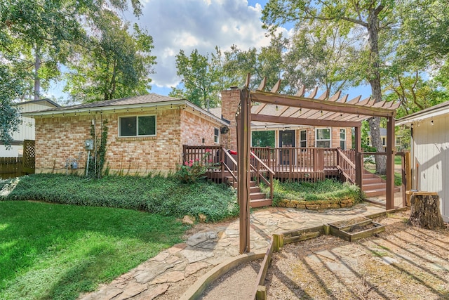 exterior space with a pergola, a yard, and a deck