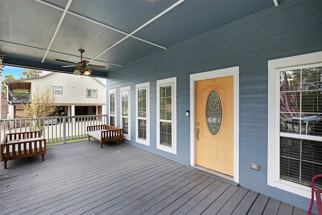 wooden deck with ceiling fan