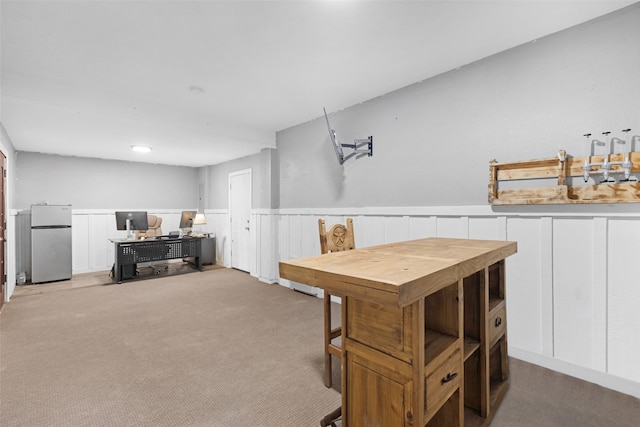 view of carpeted dining area